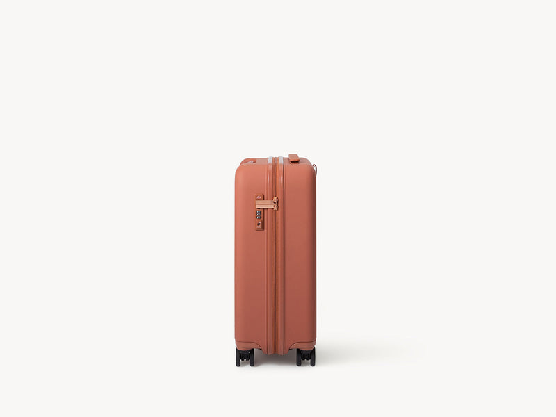 スーツケース「moln」のSmall+サイズのテラコッタ色の側面画像